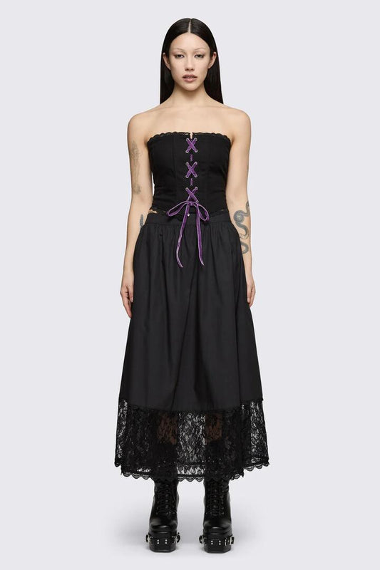 Image of a model wearing Skirts. Product name - Spectre Midi Skirt in Black colour by brand - Dangerfield