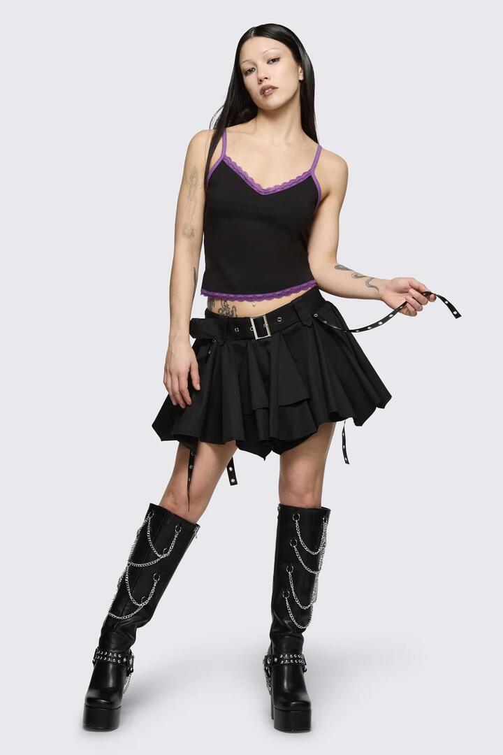 Image of a model wearing Skirts. Product name - Round & Round Skort in Black colour by brand - Dangerfield