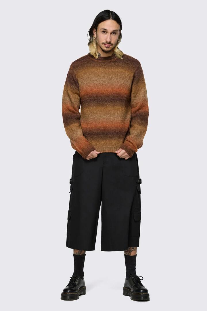 Image of a model wearing Tops. Product name - Low Whisper Gradient Knit in Brown colour by brand - Black Friday