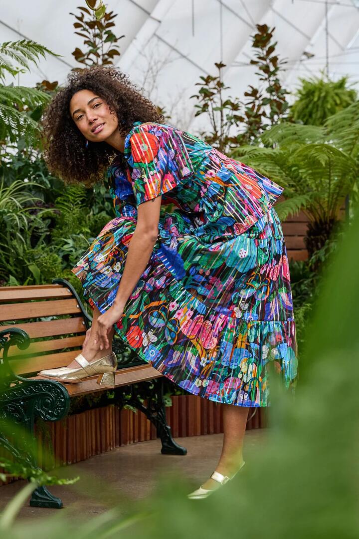 Image of a model wearing Skirts. Product name - Mariposa Glitter Party Skirt in Print colour by brand - Gorman