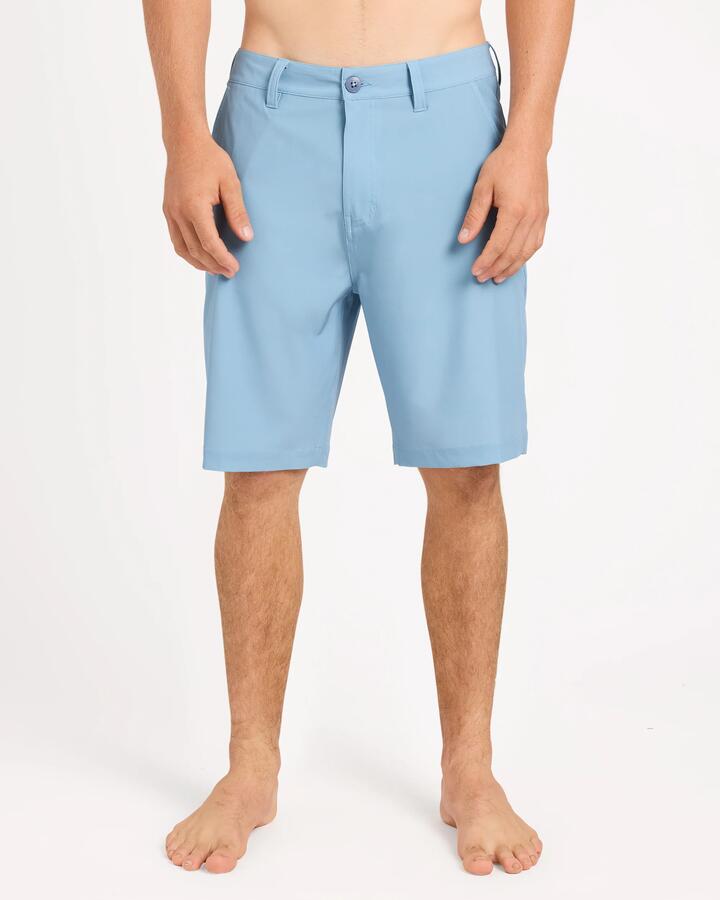 Image of a model wearing Shorts. Product name - Quiksilver Mens Union Amphibian 20" Hybrid Shorts Faded Denim in Faded Denim colour by brand - Quiksilver