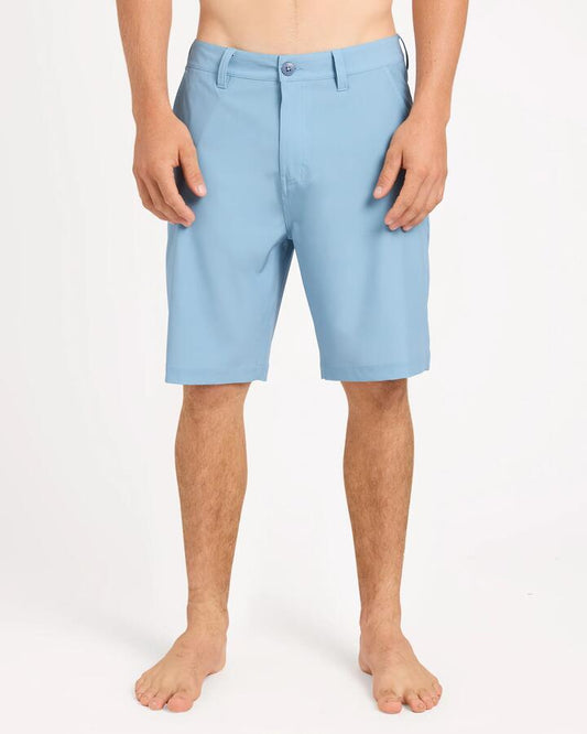 Image of a model wearing Shorts. Product name - Quiksilver Mens Union Amphibian 20" Hybrid Shorts Faded Denim in Faded Denim colour by brand - Quiksilver