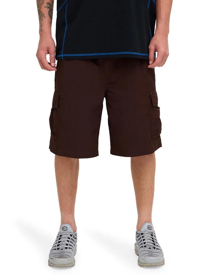 Image of a model wearing Shorts. Product name - Quiksilver Mens Stab 22" Walkshorts Coffee Bean in Coffee Bean colour by brand - Quiksilver