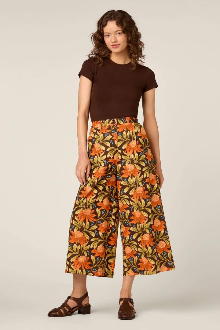 Image of a model wearing Pants. Product name - Waratah Relaxed Culotte in Chocolate colour by brand - Princess Highway