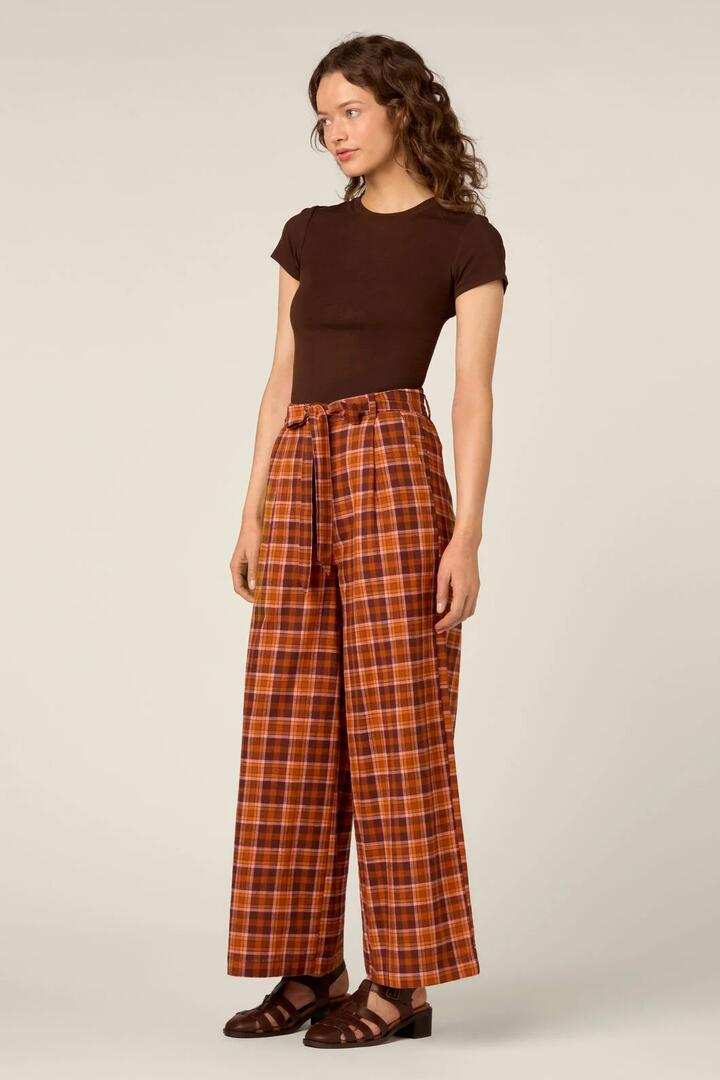 Image of a model wearing Pants. Product name - Edwina Check Wide Leg Pant in Chocolate colour by brand - Princess Highway