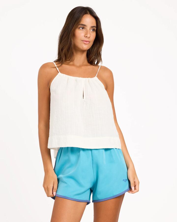 Image of a model wearing Tops. Product name - Roxy Womens Tidal Top Cloud Dancer in Cloud Dancer colour by brand - Roxy