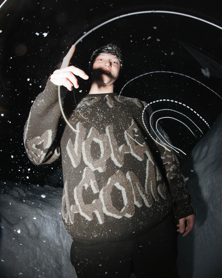 Image of a model wearing Outerwear. Product name - Volcom Stone Jacquard Sweater Black in Black colour by brand - Volcom