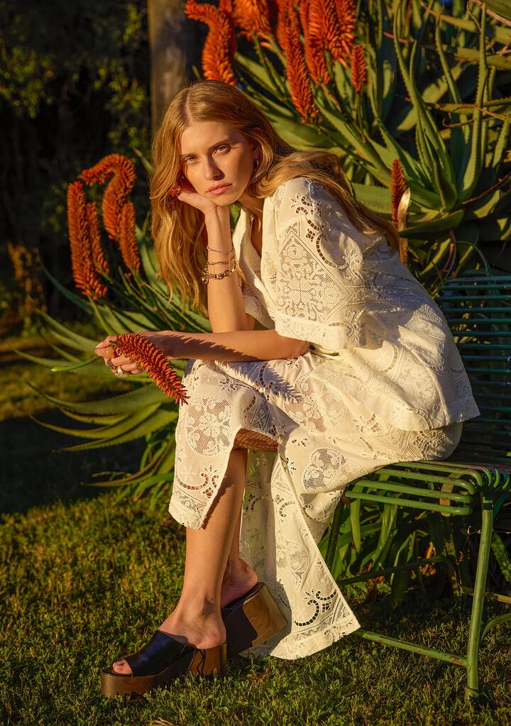 Image of a model wearing Skirts. Productname: Lotus Skirt in Off White colour by brand - MOS The Label