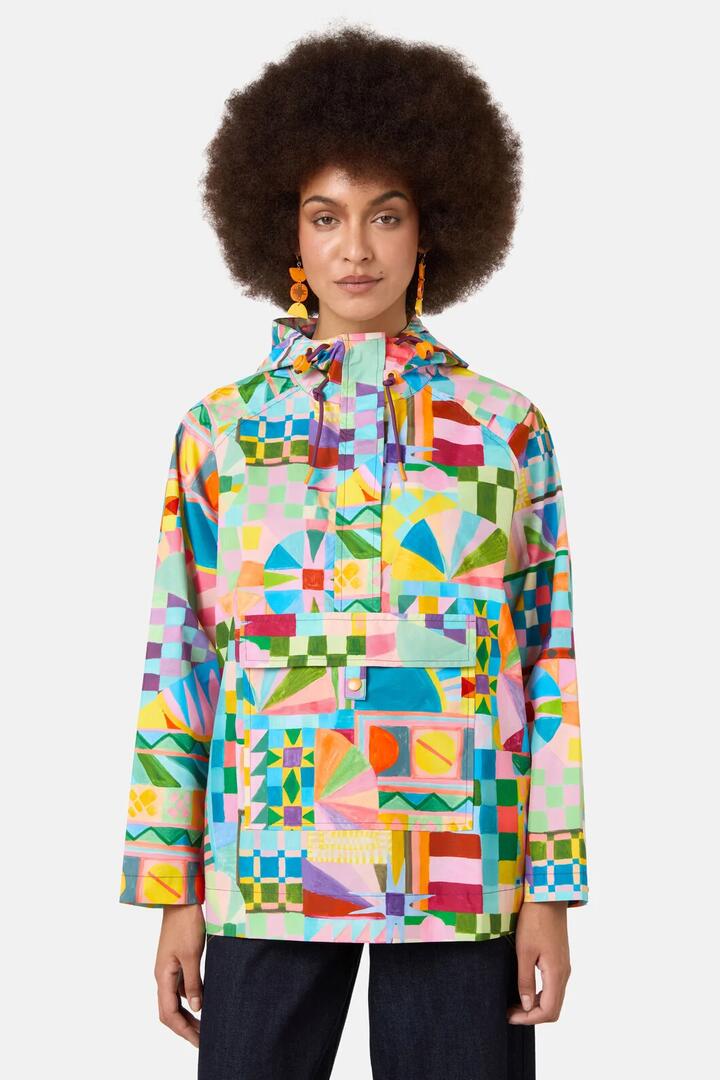 Image of a model wearing Rain Coats. Product name - Sunspill Raincoat in Print colour by brand - Gorman