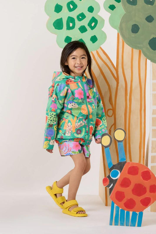 Image of a model wearing Rain Coats. Product name - Woodend Kids Raincoat in Green colour by brand - Gorman