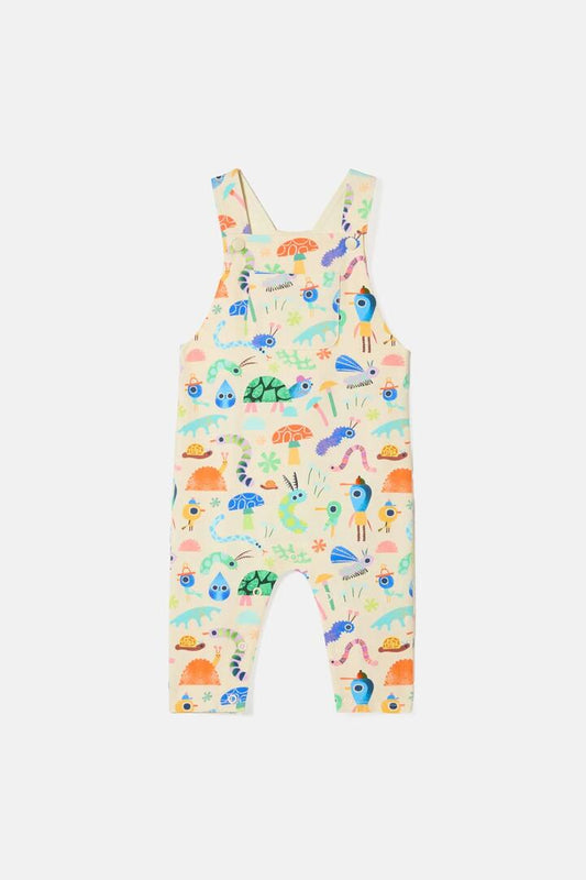 Image of a model wearing Pants. Product name - Garden Pals Baby Overalls in Cream colour by brand - Gorman