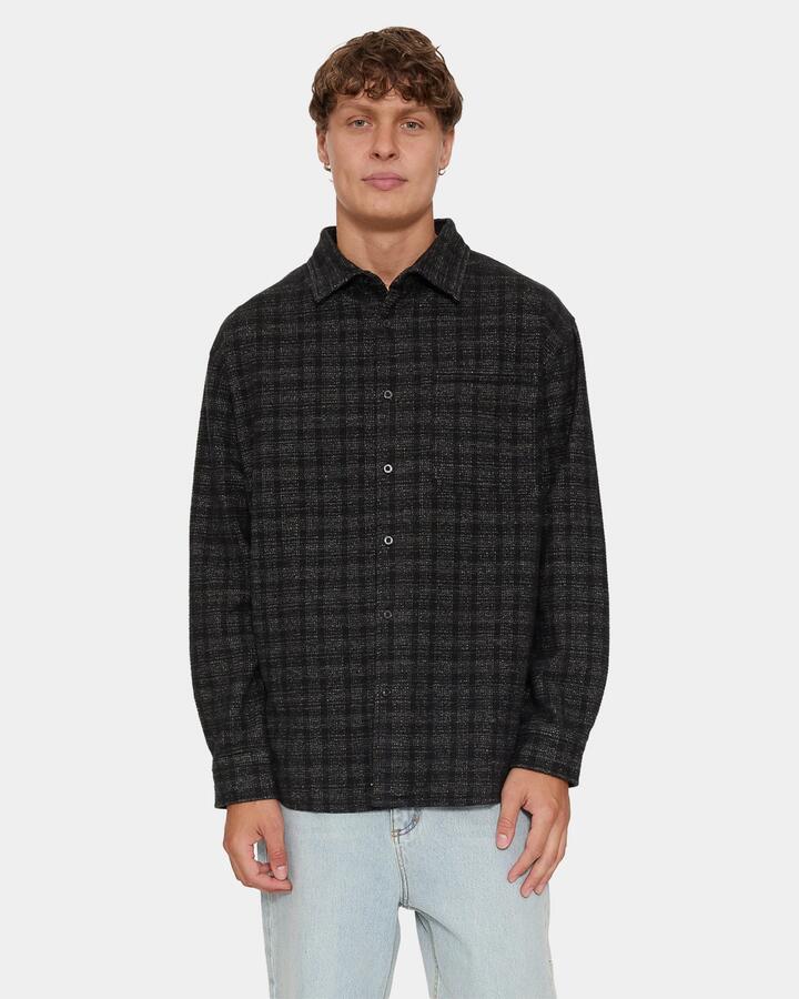 Image of a model wearing Tops. Product name - Thrills Thrills Union Barrio Long Sleeve Fl Blk1 Black in Black colour by brand - Thrills