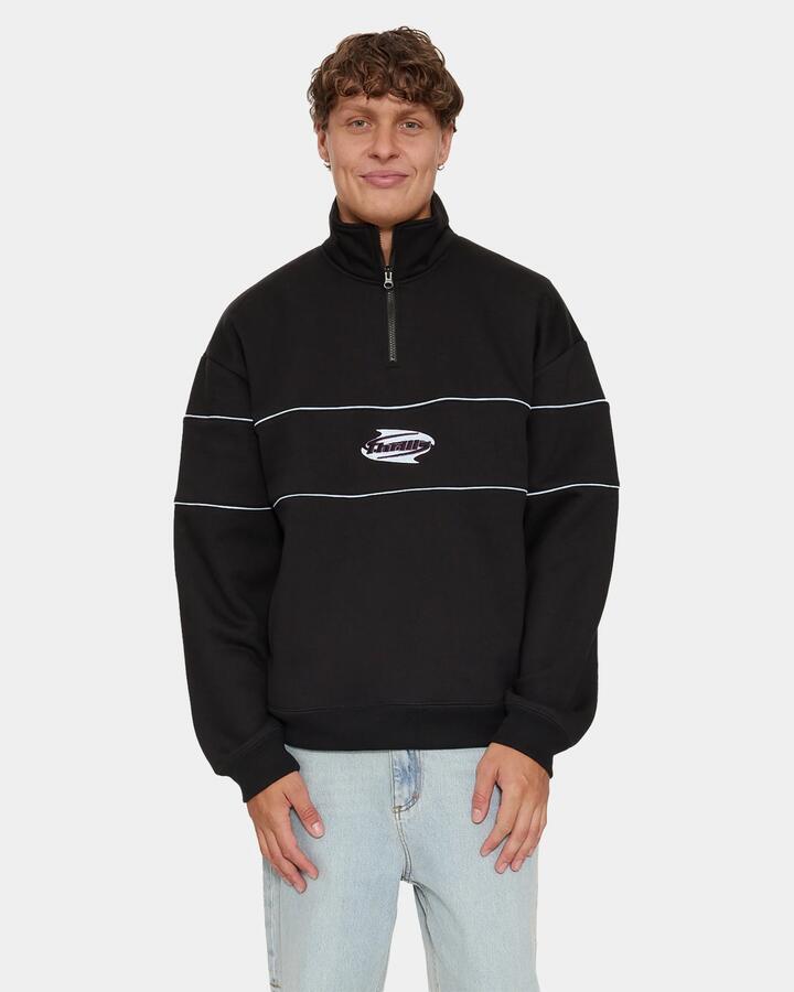 Image of a model wearing Outerwear. Product name - Thrills Split Decisions Quarter Zip Fleece Blk1 Black in Black colour by brand - Thrills