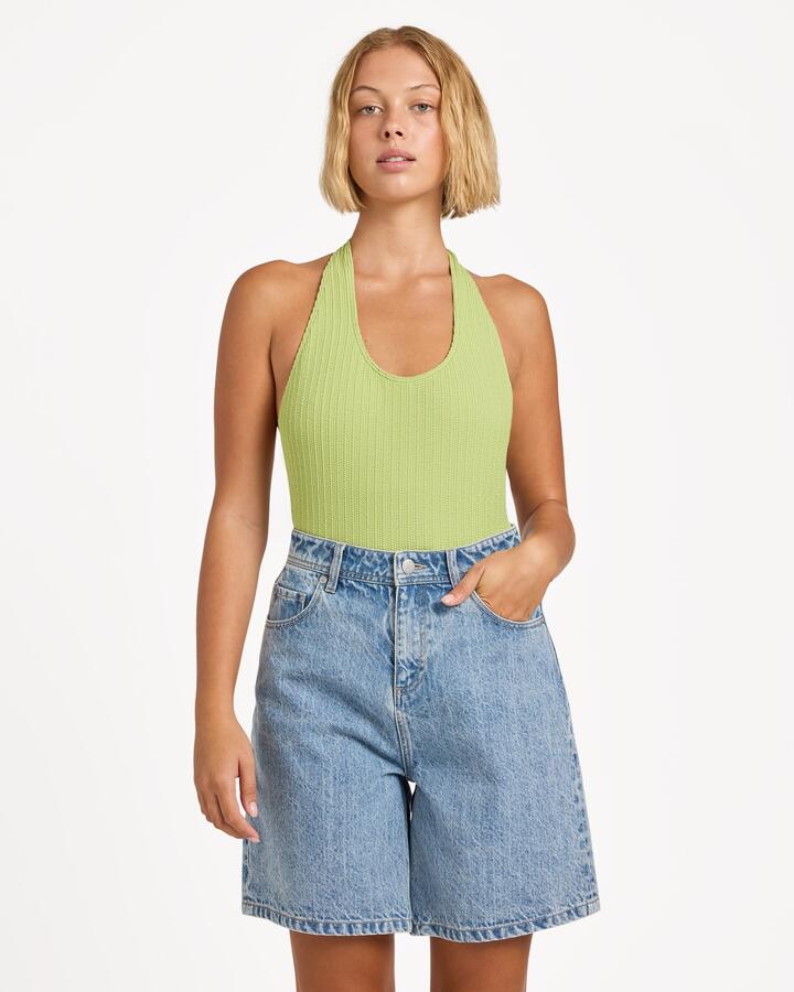 Image of a model wearing Shorts. Product name - Roxy Womens Breeze Bay Denim Shorts Blue Fade in Blue Fade colour by brand - Roxy