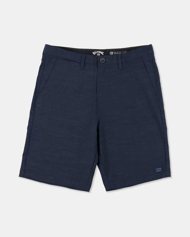 Image of a model wearing Shorts. Product name - Billabong Mens Crossfire Slub 21" Walkshorts Navy in Navy colour by brand - Billabong
