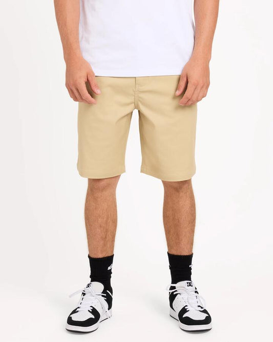 Image of a model wearing Shorts. Product name - Quiksilver Mens Union Regular 20" Walkshorts Pale Khaki in Pale Khaki colour by brand - Quiksilver