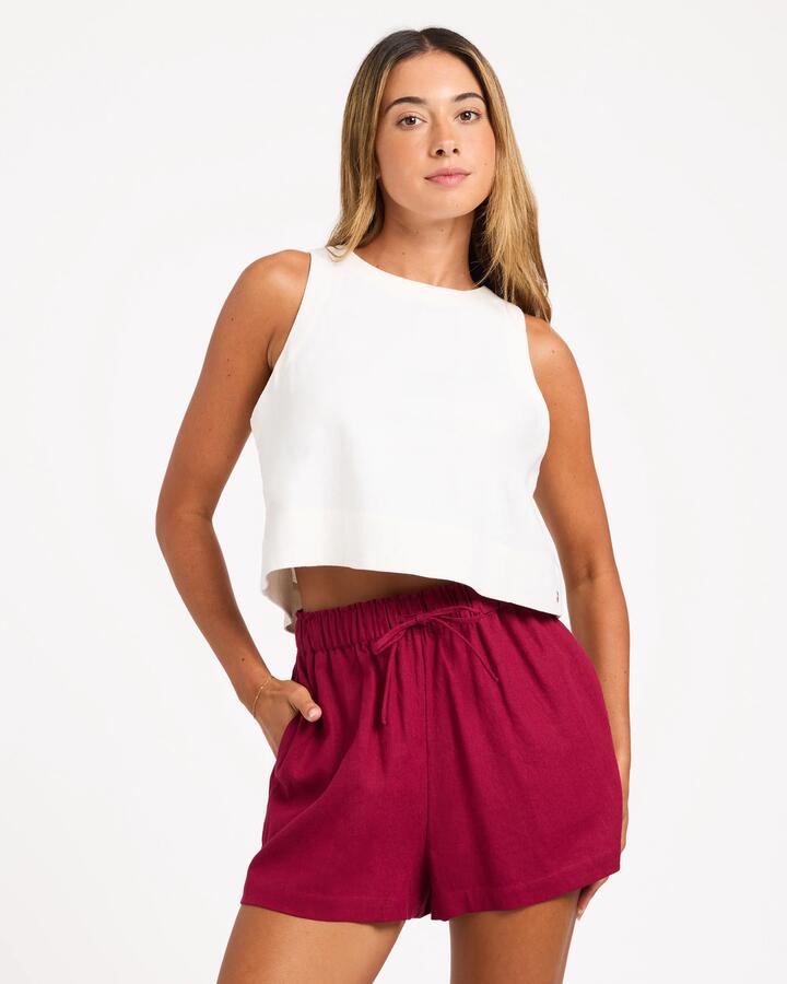 Image of a model wearing Shorts. Product name - Roxy Womens Place To Be Elastic Waist Shorts Beet Red in Beet Red colour by brand - Roxy