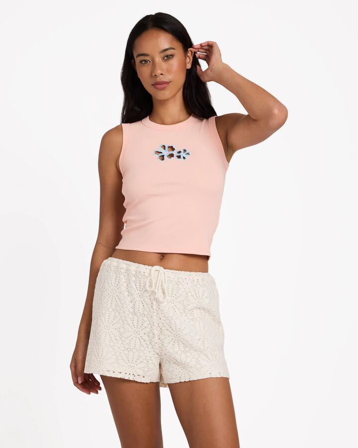 Image of a model wearing Tops. Product name - Billabong Womens Hibiscus Dream Tank Top Peach Parfait in Peach Parfait colour by brand - Billabong