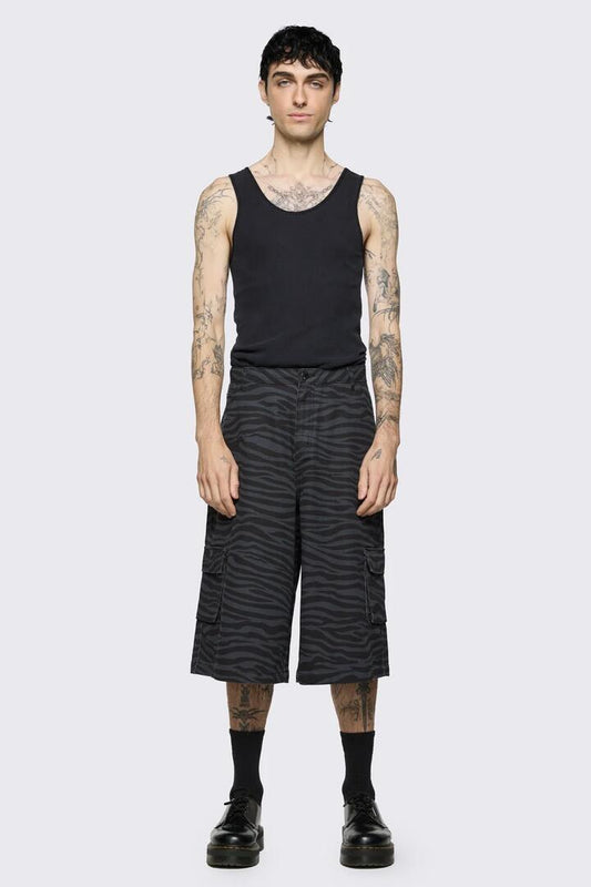 Image of a model wearing Shorts. Product name - Untamed Jorts in Grey colour by brand - Dangerfield