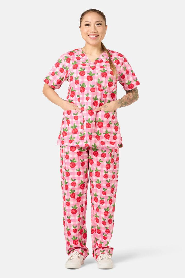 Image of a model wearing Uniforms & Workwear. Product name - Radish Scrub Set in Pink colour by brand - Scrubs With Love