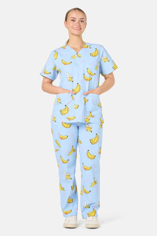 Image of a model wearing Uniforms & Workwear. Product name - Bananas Scrub Set in Light Blue colour by brand - Scrubs With Love