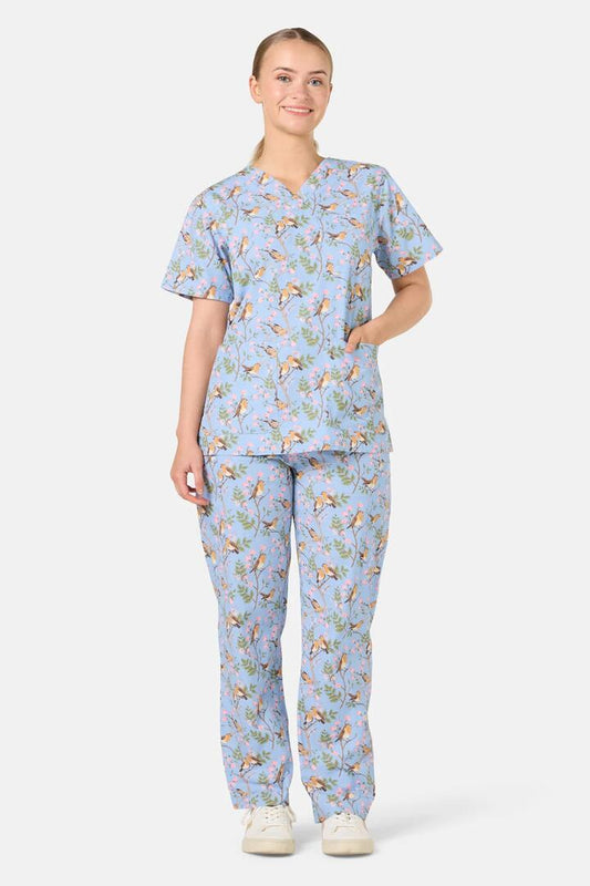 Image of a model wearing Uniforms & Workwear. Product name - Robin Scrub Set in Light Blue colour by brand - Scrubs With Love