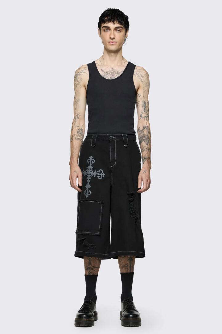 Image of a model wearing Shorts. Product name - Sunday Short in Black colour by brand - Black Friday
