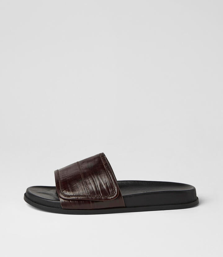 Image of Slippers. Product name - Hyobi Choc Black Embossed Leather Slides in Choc-Black Sole colour by brand - MOLLINI