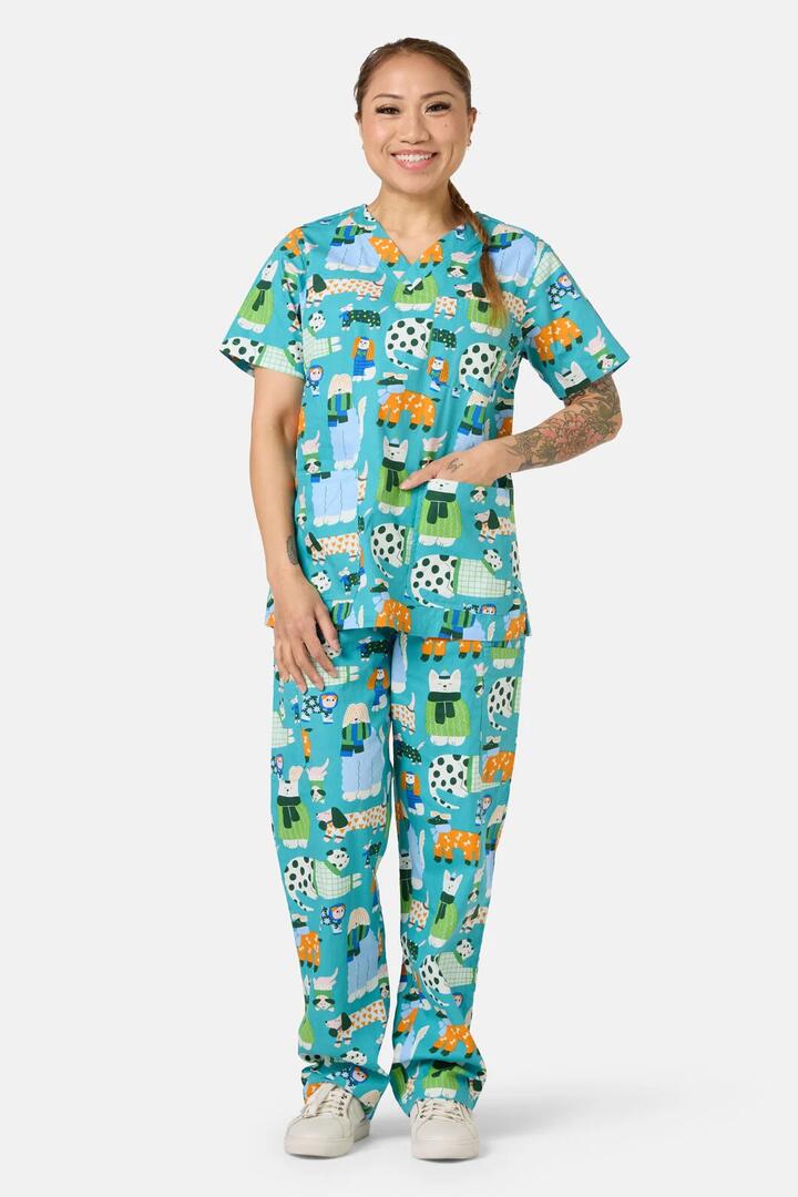 Image of a model wearing Uniforms & Workwear. Product name - Sweater Dogs Scrub Set in Multi colour by brand - Gorman