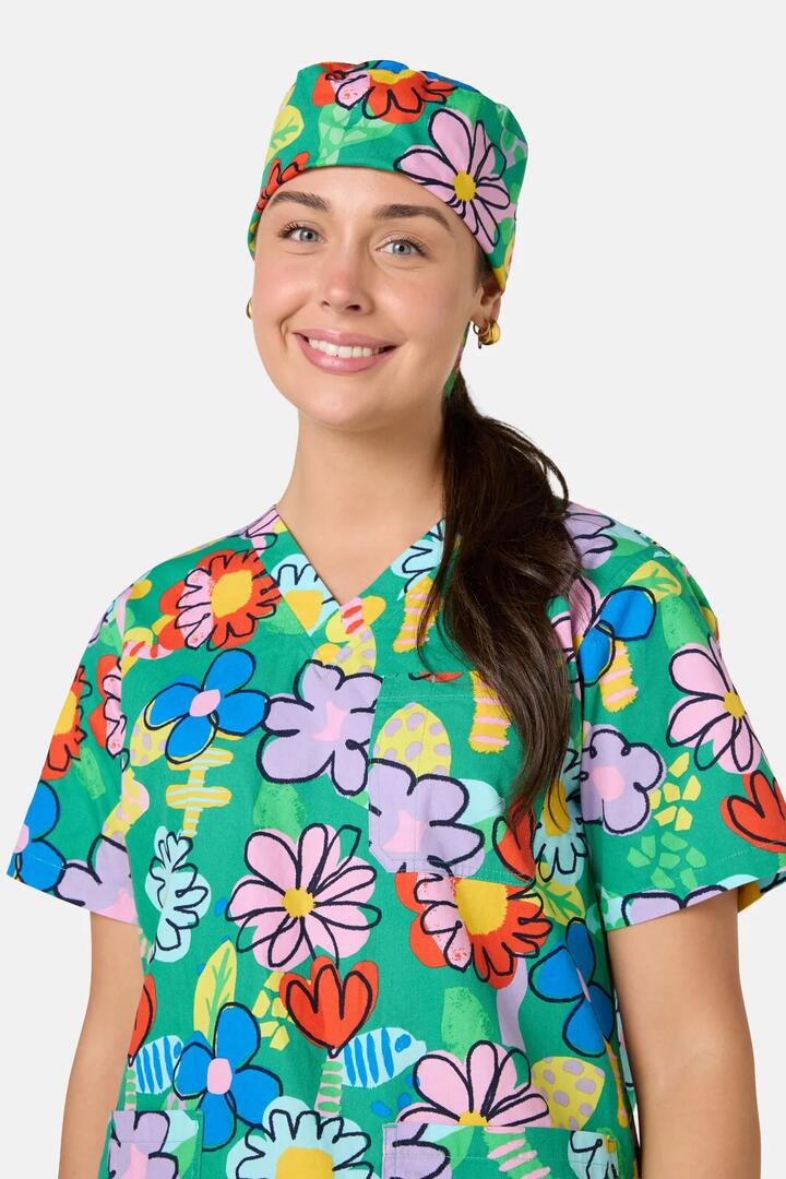 Image of a model wearing Uniforms & Workwear. Product name - Floral Pop Scrub Hat in Green colour by brand - Gorman