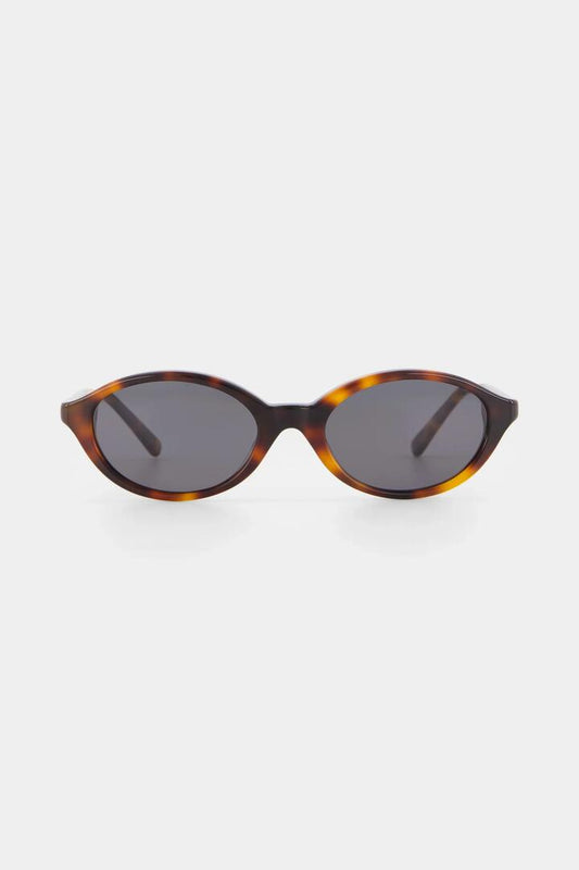 Image of Sunglasses. Product name - Mirabel Tort Narrow Oval Sunglasses in colour by brand - Isle of Eden