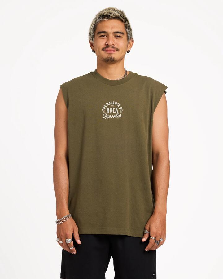 Image of a model wearing Tops. Product name - RVCA Mens Semi Rvca Muscle Fatigue in Fatigue colour by brand - RVCA