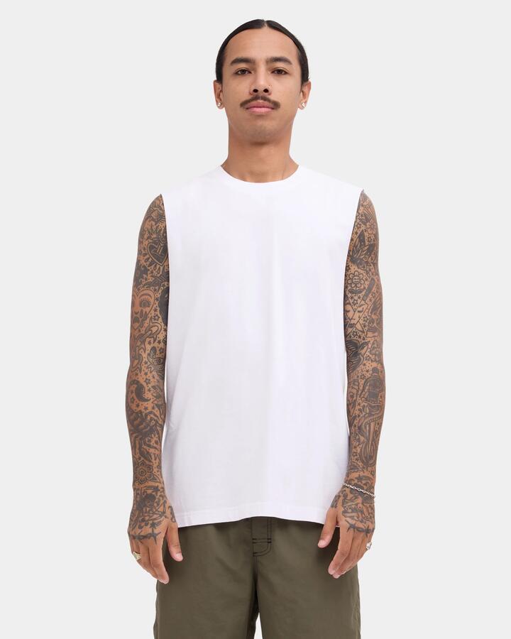 Image of a model wearing Tops. Product name - RVCA Mens Rvca Standard Muscle White in White colour by brand - RVCA