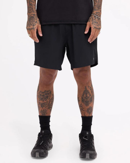 Image of a model wearing Shorts. Product name - Rvca Mens Yogger 2 In1 17" Train Shorts Black in Black colour by brand - Rvca