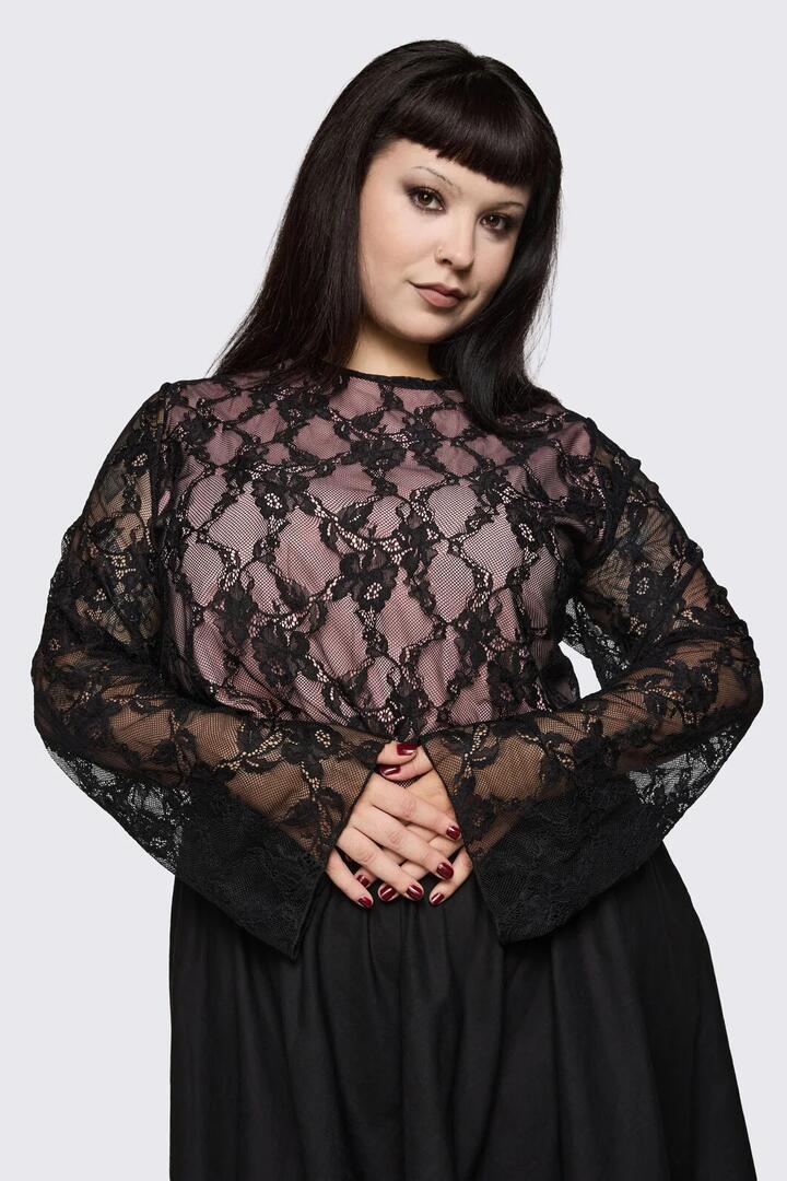 Image of a model wearing Tops. Product name - Curve Broken Rollercoaster Lace Top in Black/Pink colour by brand - Dangerfield