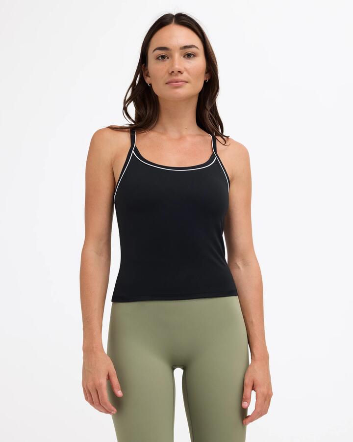 Image of a model wearing Tops. Product name - RVCA Womens Va Classic Strapy Tank Top Rvca Black in Rvca Black colour by brand - RVCA