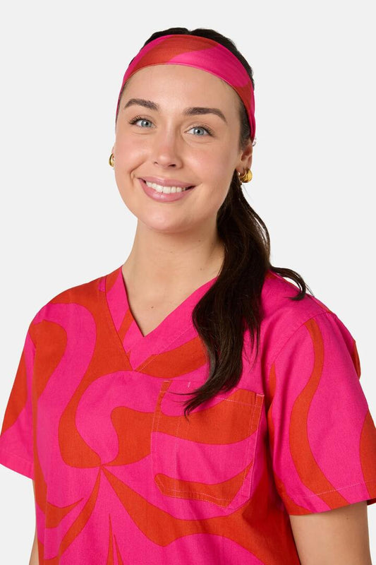 Image of a model wearing Uniforms & Workwear. Product name - Wavelength Scrub Headband in Pink colour by brand - Gorman