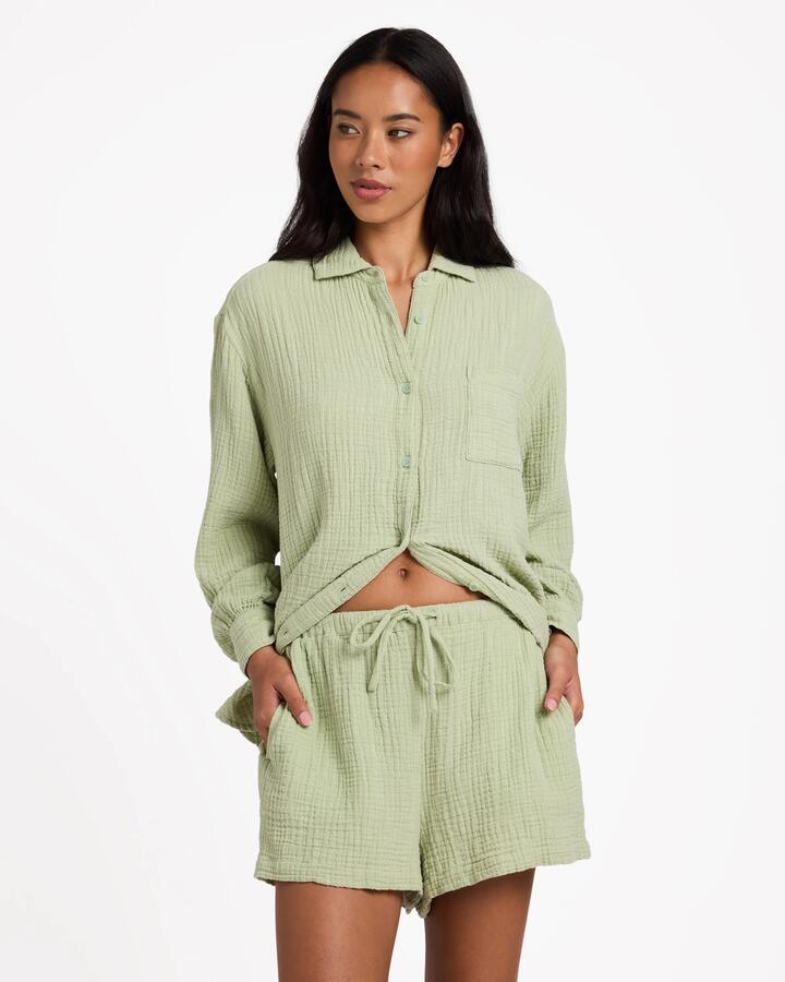 Image of a model wearing Tops. Product name - Billabong Womens Wanderer Long Sleeve Shirt Crystal Green in Crystal Green colour by brand - Billabong