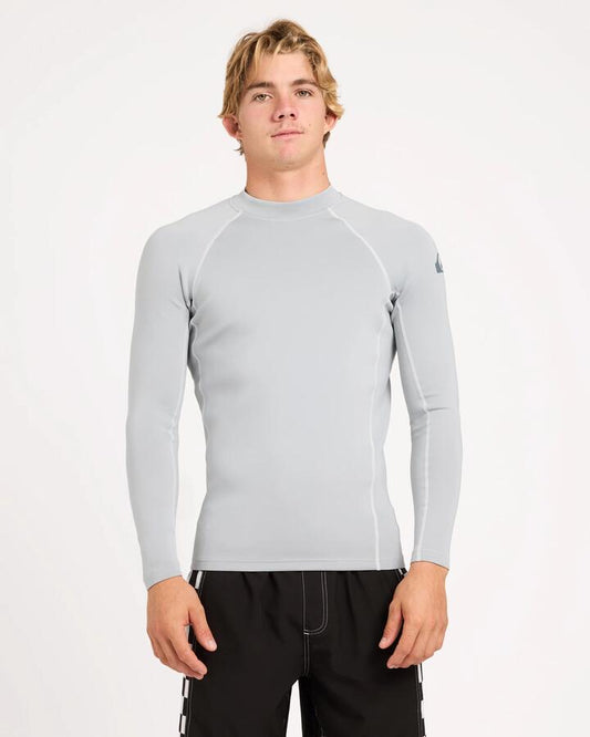 Image of a model wearing Tops. Product name - Quiksilver Mens Everyday Heat Long Sleeve Rash Vest Quarry in Quarry colour by brand - Quiksilver