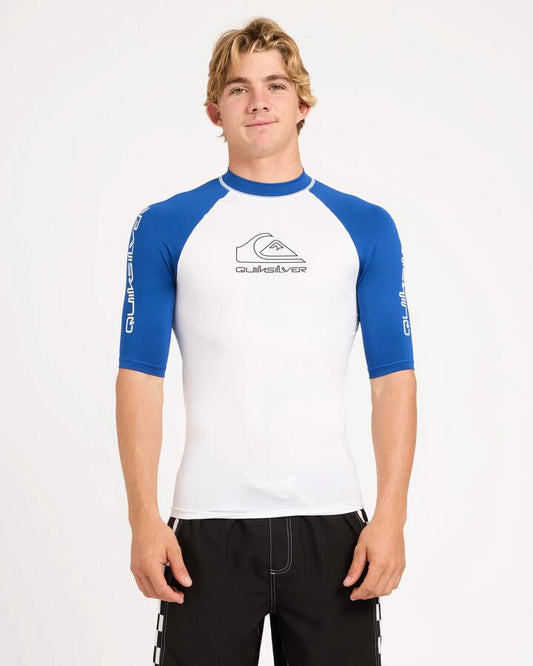 Image of a model wearing Tops. Product name - Quiksilver Mens On Tour Upf 50 Short Sleeve Rashguard White/Monaco Blue in White/Monaco Blue colour by brand - Quiksilver