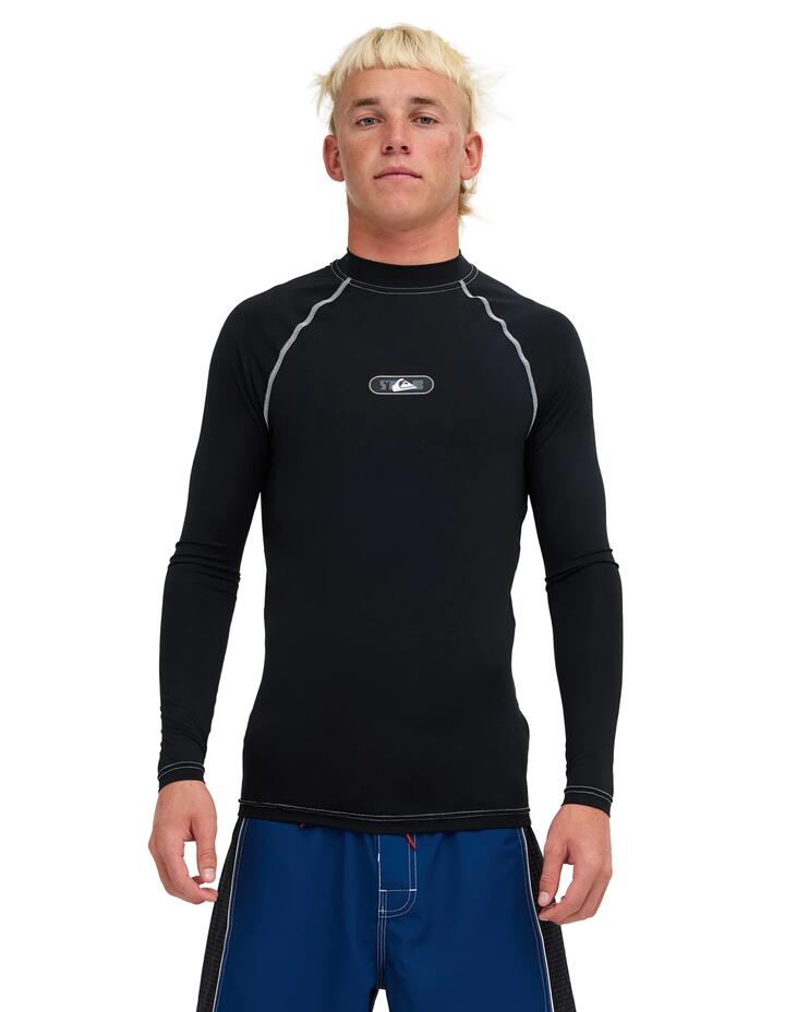 Image of a model wearing Tops. Product name - Quiksilver Mens Stab Long Sleeve Rashguard Black in Black colour by brand - Quiksilver