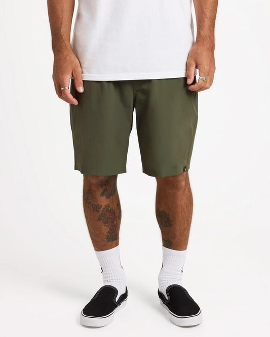 Image of a model wearing Shorts. Product name - Volcom Mens Frickin Cross Shred 19" Hybrid Shorts Squadron Green in Squadron Green colour by brand - Volcom