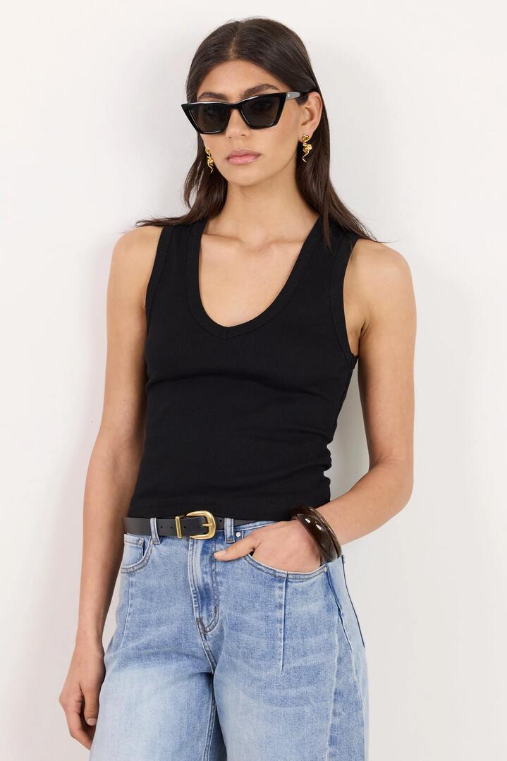 Image of a model wearing Tops. Product name - Vale Black V Neck Rib Tank in Black colour by brand - Among the Brave