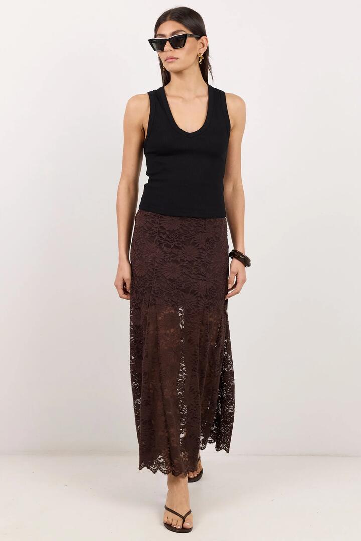 Image of a model wearing Skirts. Product name - Moral Chocolate Lace Maxi Skirt in Chocolate Lace colour by brand - Georgia Zoe