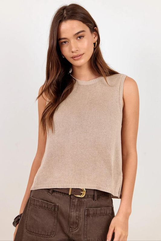 Image of a model wearing Outerwear. Product name - Salute Sand Relaxed Sleeveless Knit Tank Top in Sand colour by brand - Among the Brave