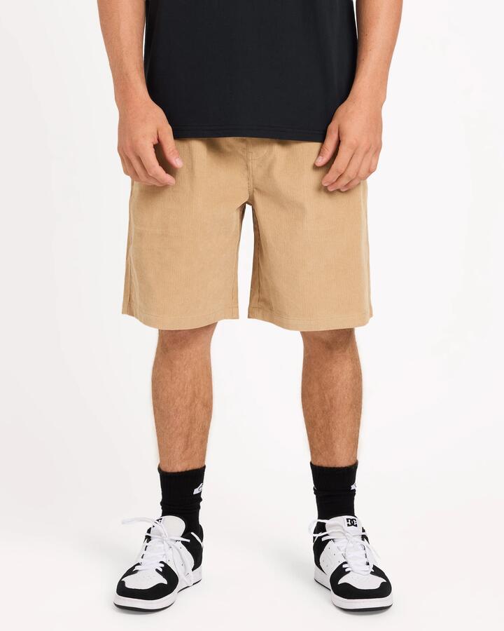 Image of a model wearing Shorts. Product name - Quiksilver Mens Taxer Corduroy 20" Walkshorts Khaki in Khaki colour by brand - Quiksilver