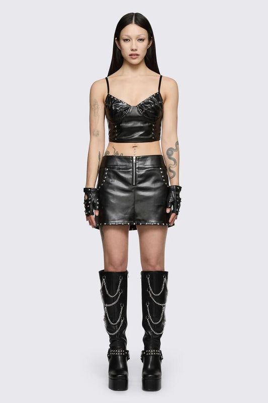 Image of a model wearing Skirts. Product name - Cindy Mini Skirt in Black colour by brand - Dangerfield