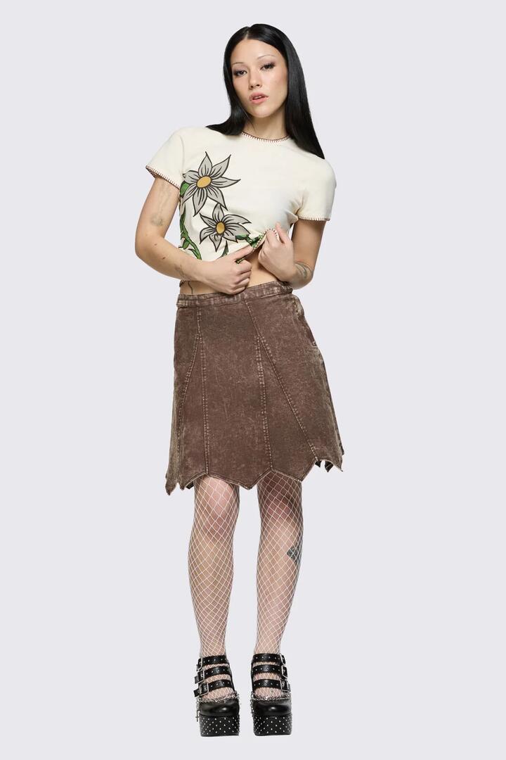 Image of a model wearing Skirts. Product name - Behind The Blinds Denim Skirt in Brown colour by brand - Black Friday