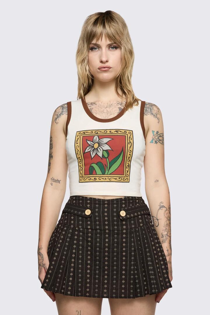 Image of a model wearing Tops. Product name - Low Whisper Tank in Cream colour by brand - Black Friday