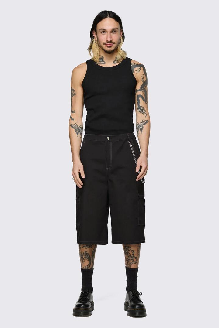 Image of a model wearing Shorts. Product name - Ghouls Utility Shorts in Black colour by brand - Dangerfield